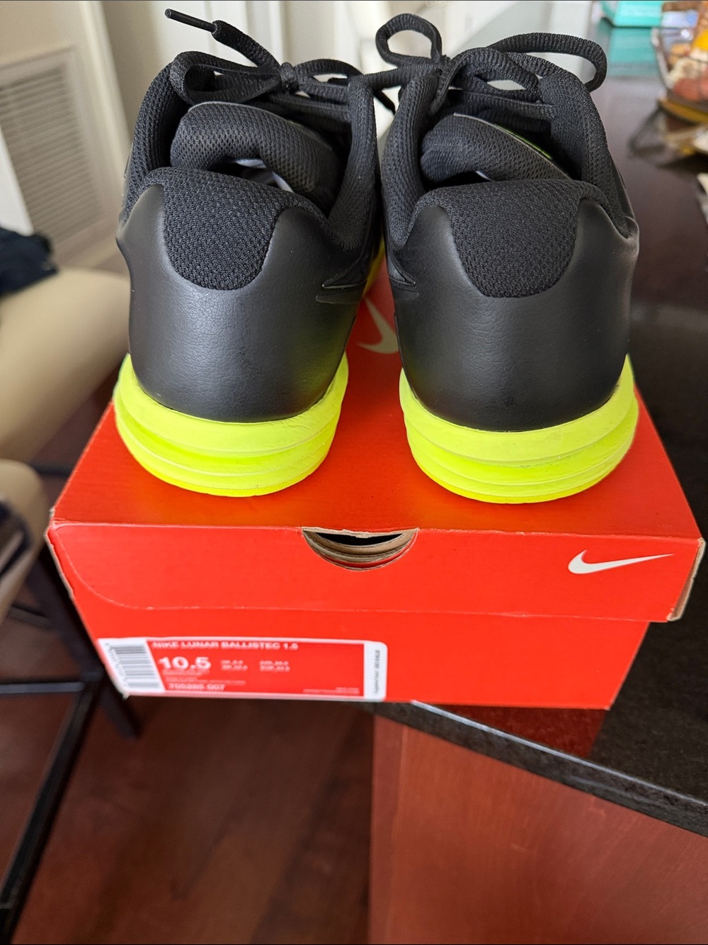 Nike Men’s Lunar Ballistec 1.5 Tennis Black Sneakers with Neon Yellow Soles.